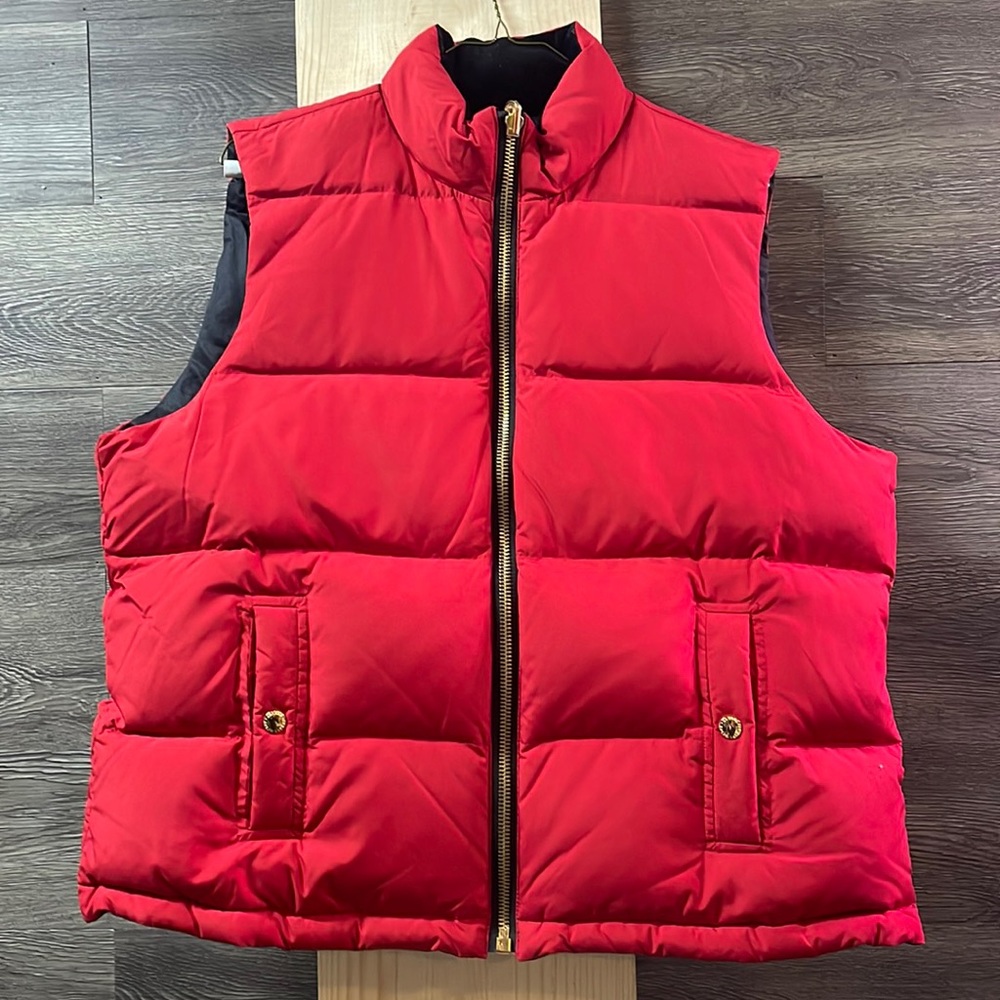 Red on one side black on the outside with Ralph Lauren emblem on the backside